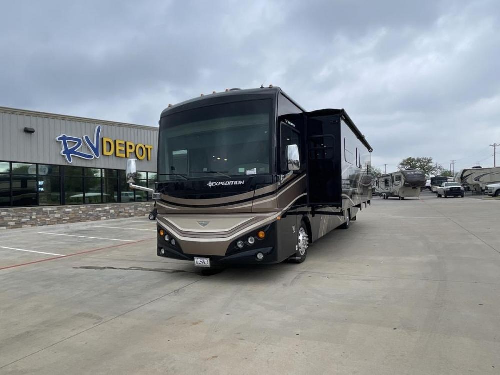 2016 BLACK DES FLEETWOOD EXPEDITION 38K (4UZACWDT2GC) , Length: 38.62 ft | Gross Weight: 32,400 lbs. | Slides: 3 transmission, located at 4319 N Main St, Cleburne, TX, 76033, (817) 678-5133, 32.385960, -97.391212 - The 2016 Fleetwood Expedition 36K motorhome runs for about 50,505 miles. The dimensions are 38.62 ft in length, 8.5 ft in width, 12.83 ft in height, 7 ft interior height, and a wheelbase of 21 ft. It has a towing capacity of 10,000 lbs and a GVWR of 32,400 lbs. There are three total slideouts and on - Photo #1